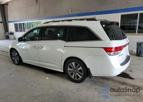 2017 Honda Odyssey Touring z USA, uszkodzony, nr VIN 5FNRL5H96HB012407